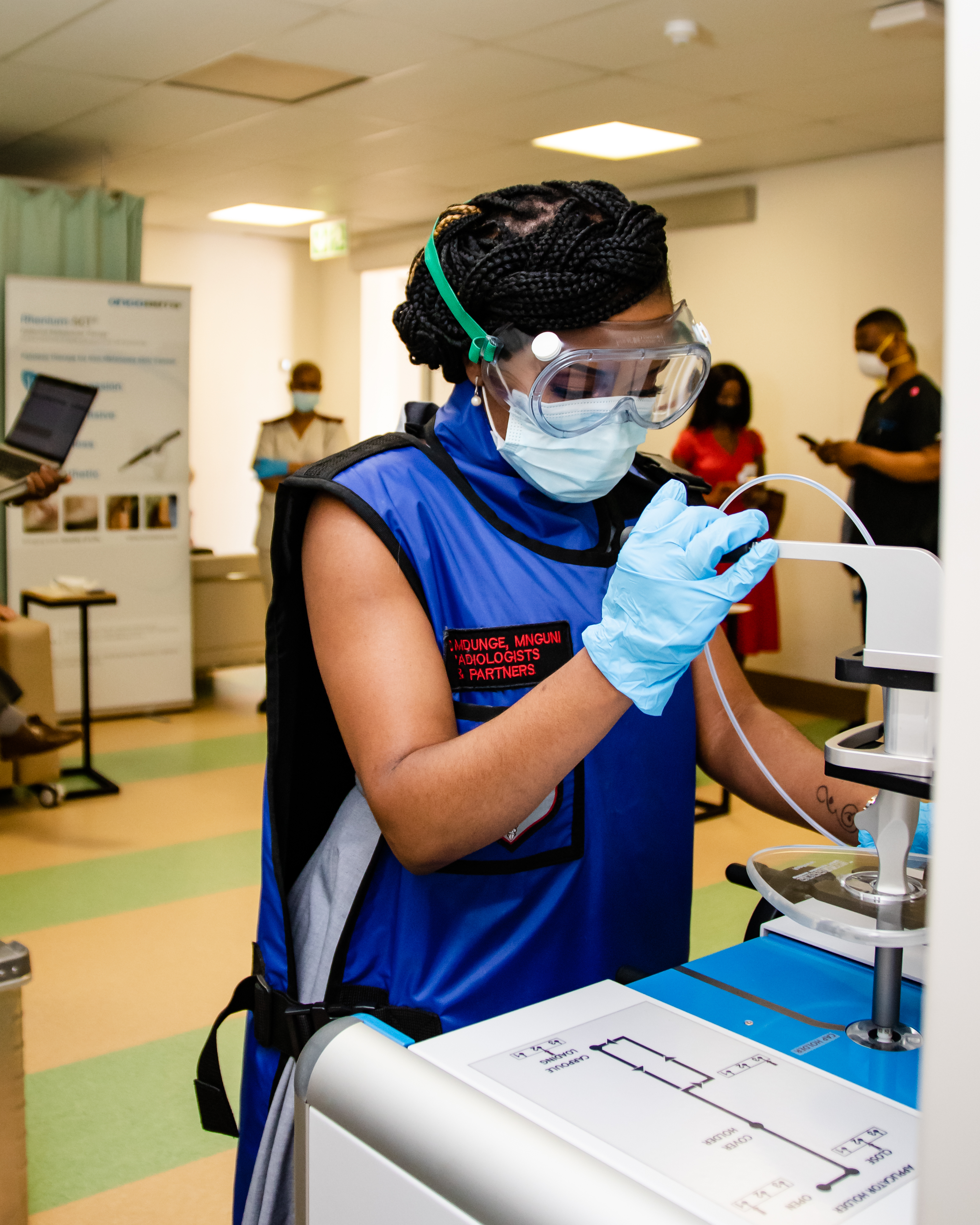 Doctor using the OncoBeta Base Station